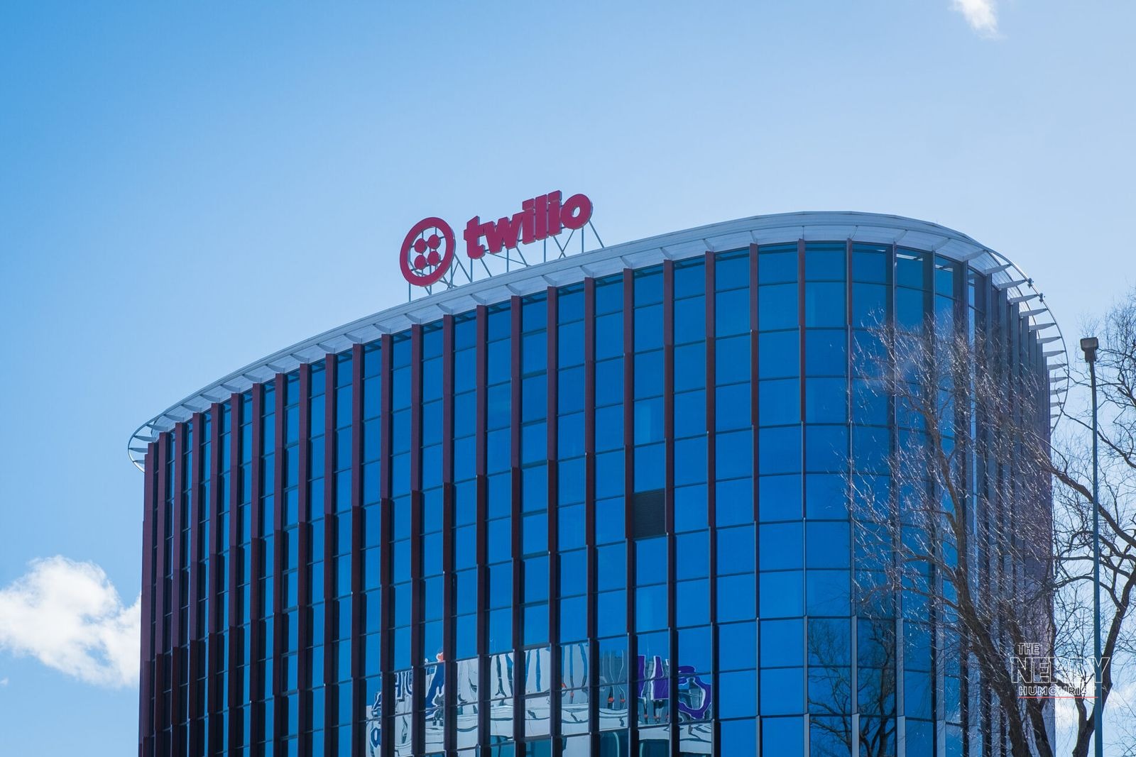 Twilio S&P 500 Warner Bros Discovery: a Twilio office building with the company's rooftop logo