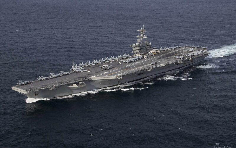 The USS Abraham Lincoln underway — the carrier earned the Presidential Unit Citation after a record 265-day deployment