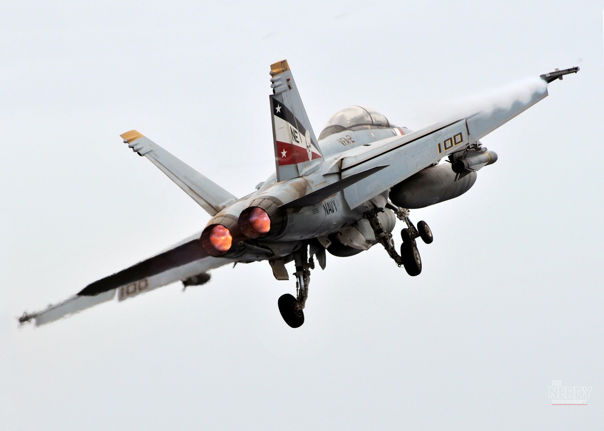 An F/A-18 launches from the USS Abraham Lincoln — the carrier earned the Presidential Unit Citation after 10,000 sorties