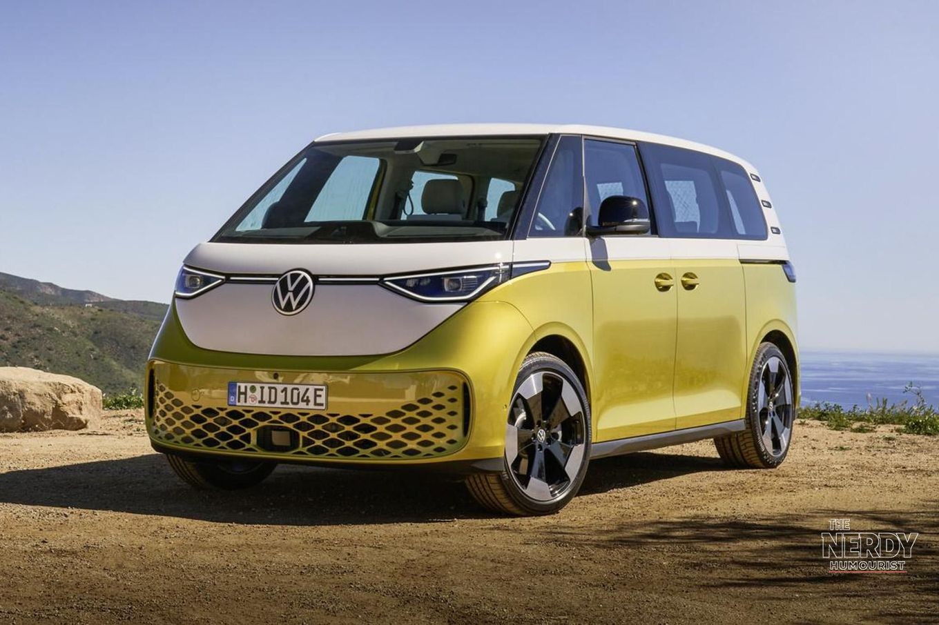 Volkswagen ID. Buzz electric van parked by the coast in two-tone yellow and white