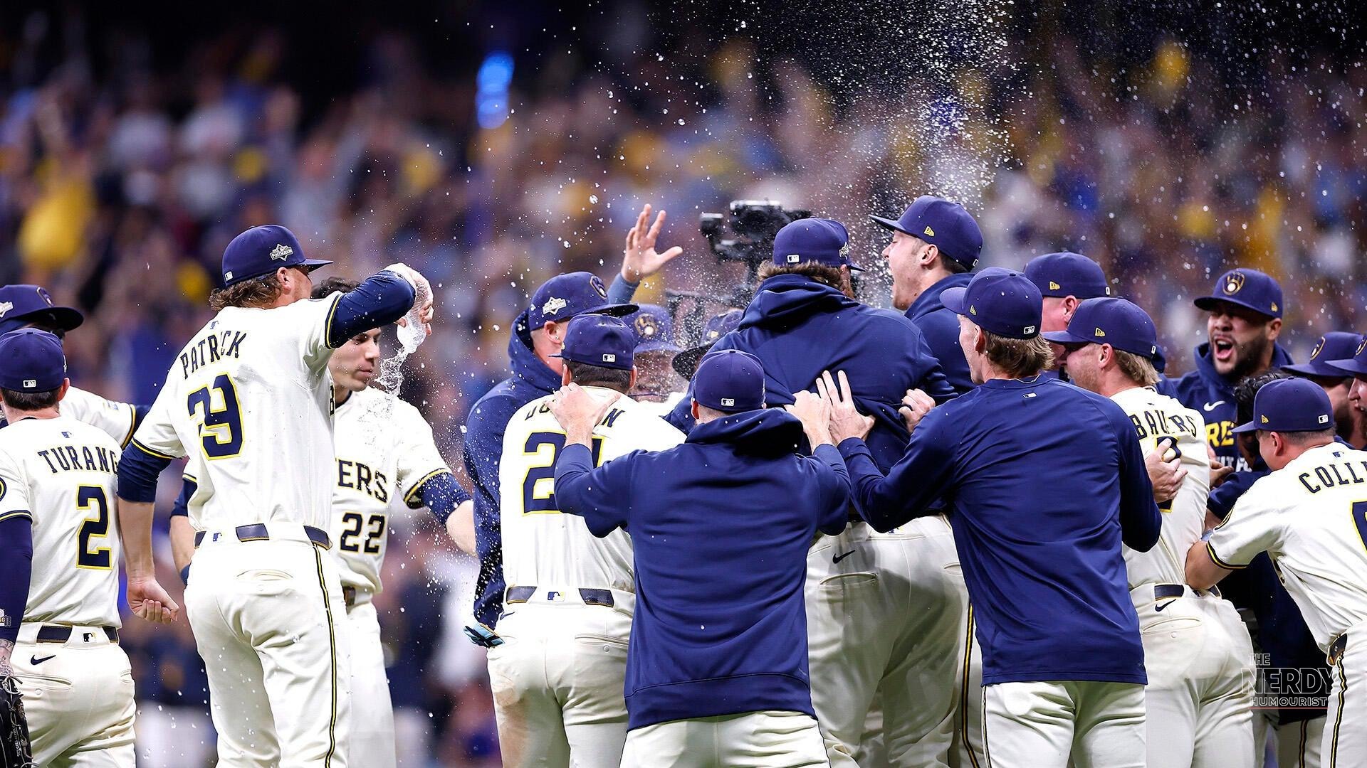 Milwaukee Brewers players celebrate on the field after a 2026 playoff win (file photo)